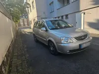 Gebraucht Kia Carens 139 PS (102 kW) 2005 Silber Van / Kleinbus