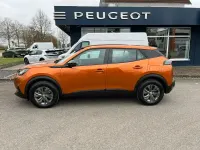 Gebraucht Peugeot e-2008 Active 100 kW (136 PS) 2022 Met. orange fusion SUV