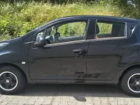 Gebraucht Chevrolet Spark 68 PS (50 kW) 2012 Schwarz Kleinwagen