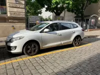 Używany Renault Mégane Initiale Paris 101 KM (74 kW) 2013 Biały Sedan/Limuzyna