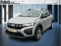 Gebraucht Dacia Sandero Stepway 101 PS (74 kW) 2024 Mondstein grau SUV