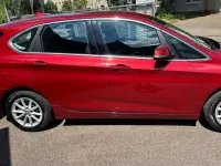 Gebraucht BMW 218 136 PS (100 kW) 2015 Flamencorot brillanteffekt met Van / Kleinbus