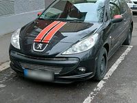 Gebraucht Peugeot 206 74 PS (54 kW) 2011 Schwarz Kleinwagen