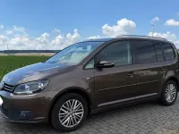 Gebraucht VW Touran Comfortline 140 PS (102 kW) 2014 Braun Van / Kleinbus