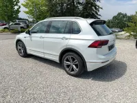 Gebraucht VW Tiguan Highline 150 PS (110 kW) 2020 Oryxweiß / titanschwarz SUV