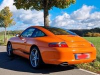 Second-hand Porsche 996 320 CP (235 kW) 2003 Portocaliu Coupe