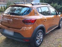 Gebraucht Dacia Sandero Expression 91 PS (66 kW) 2023 Orange Limousine