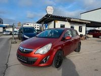 Gebraucht Opel Corsa 101 PS (74 kW) 2012 Henna rot p2 / curry red (m2) Kleinwagen