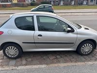 Gebraucht Peugeot 206 70 PS (51 kW) 2006 Silber Kleinwagen