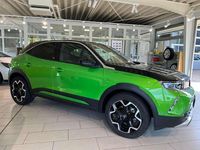 Gebraucht Opel Mokka-e Ultimate 100 kW (136 PS) 2021 Matcha green/ikone gruen SUV