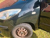 Gebraucht Hyundai i10 69 PS (50 kW) 2011 Schwarz Kleinwagen