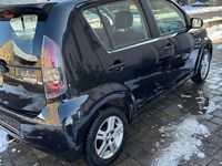 Gebraucht Daihatsu Sirion 69 PS (50 kW) 2010 Schwarz Kleinwagen