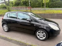 Używany Opel Corsa Cosmo 80 KM (58 kW) 2008 Czarny Hatchback