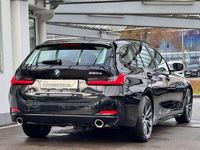 Gebraucht BMW 330e Comfort Edition 292 PS (214 kW) 2024 Schwarz (saphirschwarz) Kombi
