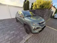 Gebraucht Dacia Spring Extreme 47 kW (65 PS) 2023 Grün Kleinwagen