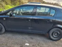 Używany Opel Corsa 80 KM (58 kW) 2009 Czarny Hatchback