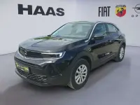 Gebraucht Opel Mokka Enjoy 131 PS (96 kW) 2023 Lackierung schwarz perla nera/ SUV