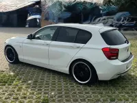 Używany BMW 118 Performance 170 KM (125 kW) 2012 Biały Hatchback