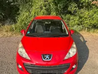 Gebraucht Peugeot 207 95 PS (69 kW) 2011 Rot Kleinwagen