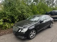 Używany Mercedes E220 170 KM (125 kW) 2011 Czarny Sedan/Limuzyna
