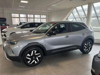 Gebraucht Opel Mokka Elegance 101 PS (74 kW) 2022 Kontrast grau/quarz silber (metallic) SUV