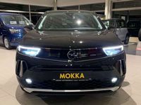 Gebraucht Opel Mokka-e Elegance 100 kW (136 PS) 2023 Karbon schwarz (metallic) SUV