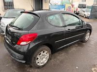 Gebraucht Peugeot 207 73 PS (53 kW) 2011 Schwarz Kleinwagen