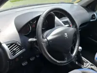 Gebraucht Peugeot 206 60 PS (44 kW) 2012 Schwarz Kleinwagen