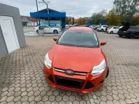 Używany Ford Focus 116 KM (85 kW) 2011 Pomarańczowy Sedan/Limuzyna
