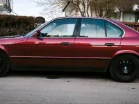 Używany BMW 520 129 KM (94 kW) 1990 Czerwony Sedan/Limuzyna