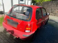 Używany Nissan Micra 54 KM (39 kW) 1999 Czerwony Hatchback