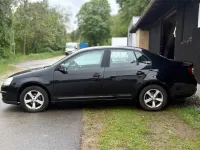 Używany VW Jetta 102 KM (75 kW) 2009 Czarny Sedan/Limuzyna