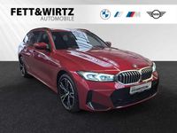 Gebraucht BMW 330e Performance 292 PS (214 kW) 2024 Fire red metallic Kombi