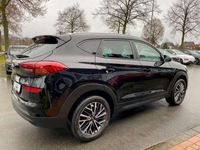 gebraucht Hyundai Tucson 1.6 Trend blue Navi Kamera Alu Sitzh.Leder