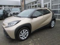 Gebraucht Toyota Aygo X Pulse 72 PS (52 kW) 2022 Ginger beige metallic/ night sky black SUV