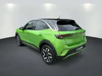 Gebraucht Opel Mokka Elegance 101 PS (74 kW) 2024 Matcha green (metallic) (metallic) SUV