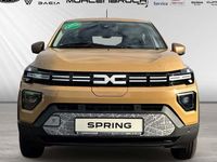 Gebraucht Dacia Spring Extreme 47 kW (65 PS) 2025 Safaribeige Kleinwagen