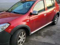 Gebraucht Dacia Sandero Stepway 86 PS (63 kW) 2011 Rot Kleinwagen