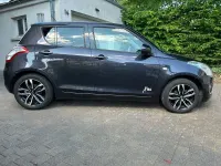 Gebraucht Suzuki Swift X-TRA 94 PS (69 kW) 2015 Grau Kleinwagen