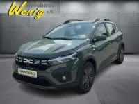 Neu Dacia Sandero Stepway 91 PS (66 kW) 2025 Safarigrüngrau Limousine