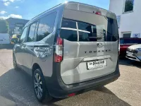 Gebraucht Ford Tourneo Courier Titanium 125 PS (91 kW) 2025 Solarsilber Van / Kleinbus