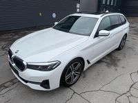 Gebraucht BMW 520 Performance 190 PS (139 kW) 2022 Mineralweiss metallic Kombi