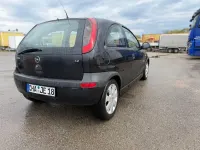 Używany Opel Corsa 75 KM (55 kW) 2003 Czarny Hatchback