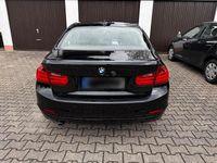 Second-hand BMW 320 184 CP (135 kW) 2012 Negru Berlinǎ