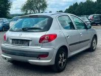 Gebraucht Peugeot 206+ Basis 68 PS (50 kW) 2011 Grau Kleinwagen