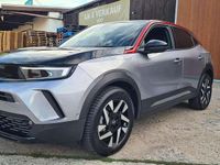 Gebraucht Opel Mokka-e GS Line 100 kW (136 PS) 2023 Artense/ dach &haube schwarz SUV