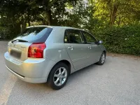 Używany Toyota Corolla 110 KM (80 kW) 2005 Srebrny Sedan/Limuzyna