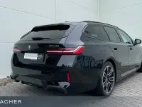 Gebraucht BMW i5 M Sport 250 kW (340 PS) 2024 Saphirschwarz metallic Kombi