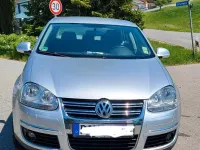 Używany VW Jetta 105 KM (77 kW) 2006 Srebrny Sedan/Limuzyna