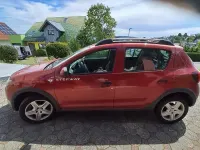 Gebraucht Dacia Sandero Celebration 90 PS (66 kW) 2013 Rot Limousine